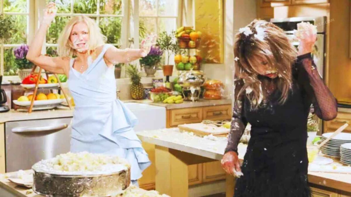  Brooke and Taylor in the middle of a cake fight during a wedding,