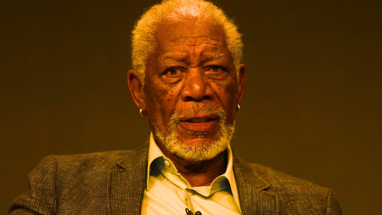 Why does Morgan Freeman wear a glove on his left hand?